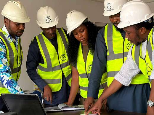 Construction workers reviewing plans