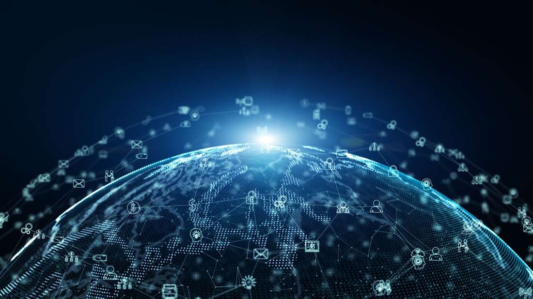 A glowing digital globe wrapped in a network of connected icons